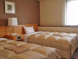 Hotel Route-Inn Suzuka Quarto foto